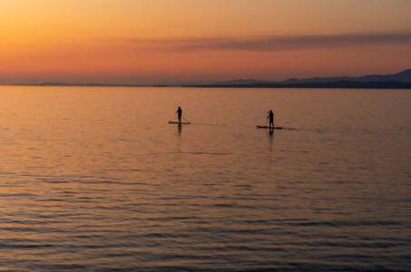 Antoinette Lebrun - Paddleboarders At Sunset